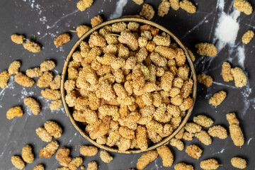 Dried mulberry. Sun-dried dried mulberry in bowl. superfood Vegetarian food concept. healthy snacks. Top view