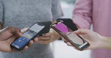 Phone, communication and data sharing with people standing in a huddle to connect to a mobile network. Contact, teamwork and information with hands closeup in a circle to search while cloud computing - Powered by Adobe