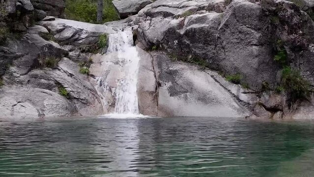 Poco azul blue pit waterfall in Peneda-Geres National Park, Portugal