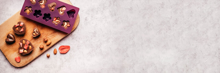 Banner with home made milk chocolate with mold.