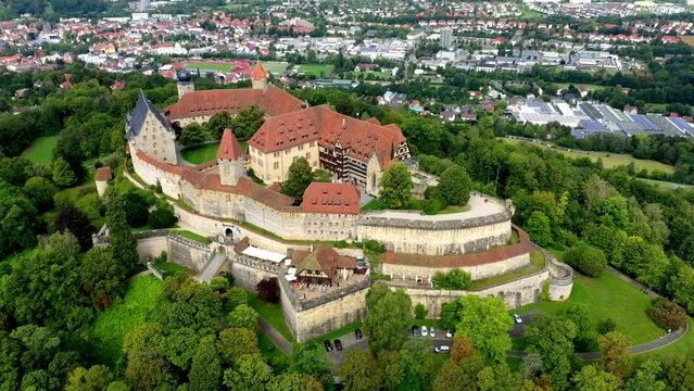 Aerial zoom-out footage of the huge and famous Coburg castle complex on the mountain