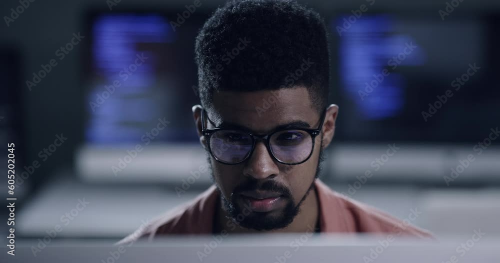 Leinwandbilder Face, glasses and programming with a black man coder working in a dark office for data processing. Focus, software development or programming with a male coder reading computer language on a database
