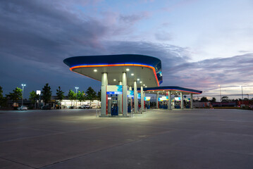 Gas station with cloud and blue sky at sunset gas station at sunset