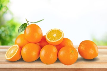 fresh juicy orange fruits on table