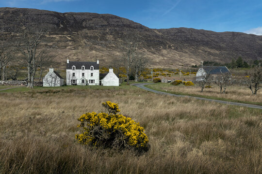 White farmhouse, church  and hills. Applecross Scottish Highlands. Scotland.
