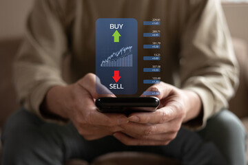 planning and strategy, Stock market, trader or investor working at home. Technical price graph and indicator, red and green candlestick chart and stock trading computer screen on hand.