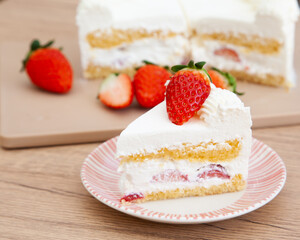 Slice of fresh strawberry shortcake with whipped cream, Japanese style