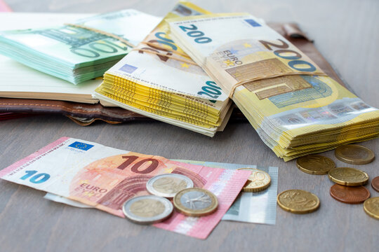 euro banknotes and coins