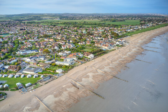 East Preston and Angmering by Sea seafront in West Sussex looking towards Kingston Gorse, Aerial photo. 