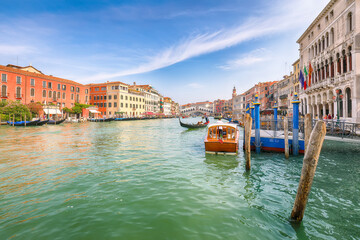 Picturesque morning cityscape of Venice with famous Canal Grande and colorful  view of Rialto Bridge