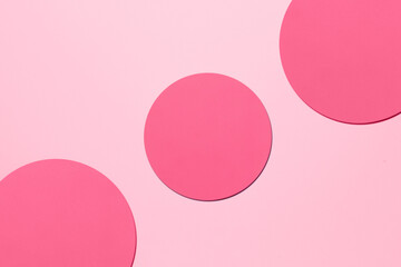 Paper pink background with shaped elements.