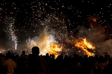 Fototapeta na wymiar The Night of San Juan with fireworks in Spain