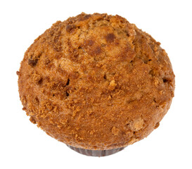 Angle view of a delicious freshly baked cinnamon muffin isolated on a white background.