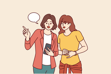 Women with phone walk around city and use navigation application to find right place in city. Traveler girl asks question to passer-by with smartphone to find way in hotel or railway station