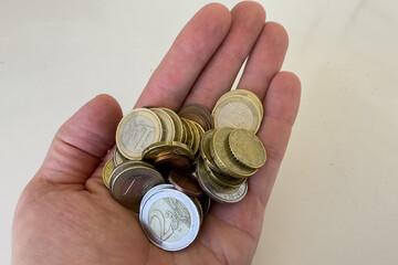 Euro coins on hand. Euro Money and cash background. Euro Money Banknotes for pay. Euro bills and...