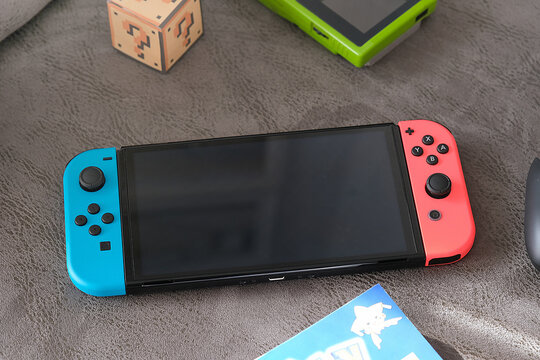 Nintendo Switch video game console in a home living room. No people.	