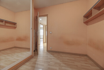 A room with dirty walls painted