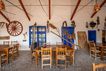 Fototapeta na wymiar Dining room of an old historic farmhouse style inn in La Mancha