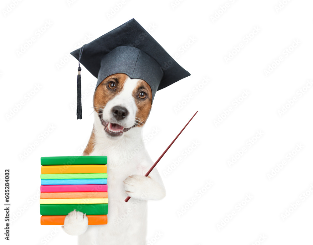 Poster graduated dog holding books and pointing away on empty space. isolated on white background