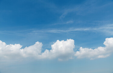 White clouds are in the blue sky