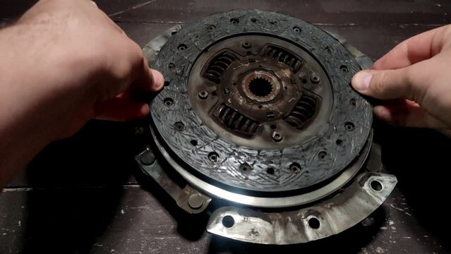 Disassembled clutch disc of a car in a car service repair shop