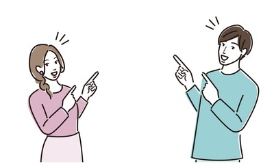 指をさして案内する男女