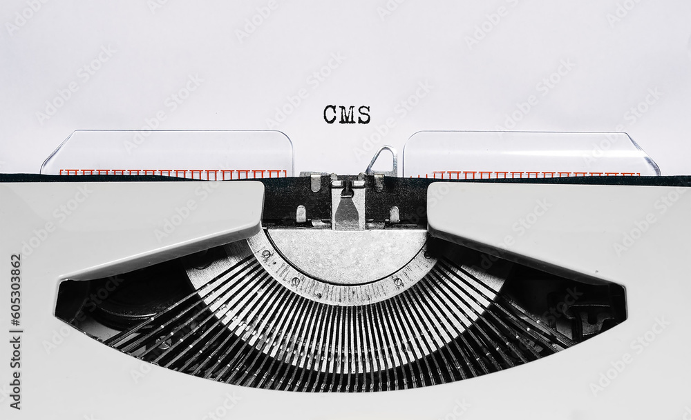 Poster text cms typed on retro typewriter