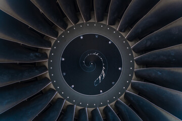 Close-up of the jet engine round and powerful turbine blades