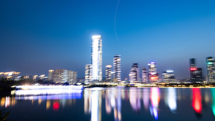 Office building reflected in the water at night