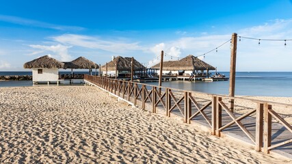 Low-angle view of modern buildings near the sea on a sunny day