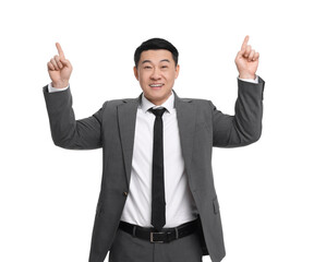 Businessman in suit pointing at something on white background