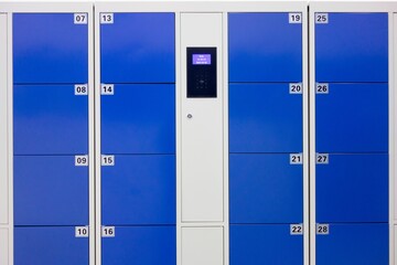Blue smart luggage locker with facial recognition barcode system