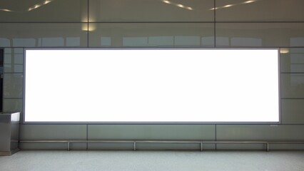 Closeup shot of a white blank billboard in a horizontal position in a modern building
