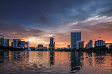 Orlando Florida Lake Eola cityscape with a sunset on the horizon