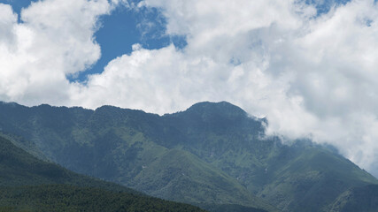 Landscape of mountain covered with fog