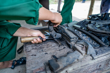 Handmade Rubber Slippers Made From Car Tire in Cu Chi tunnel, Vietnam