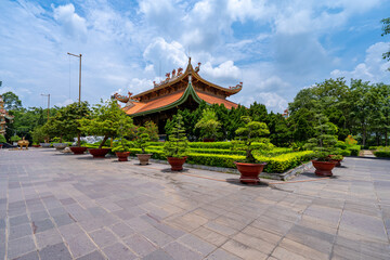 Fototapeta premium Morning at Ben Duoc Temple, Cu Chi, Ho Chi Minh city, Vietnam. The historic district revolutionary beside Cu Chi tunnel, a famous base of revolutionary Vietnam before 1975. Travel concept