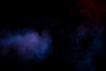 Blue and purple steam on a black background.