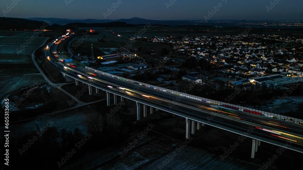 Sticker high angle view of traffic on highway bridge at night