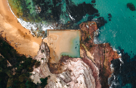 Aerial Drone Shot of Aslings Beach Rock Pool in Eden, New South Wales, Australia.