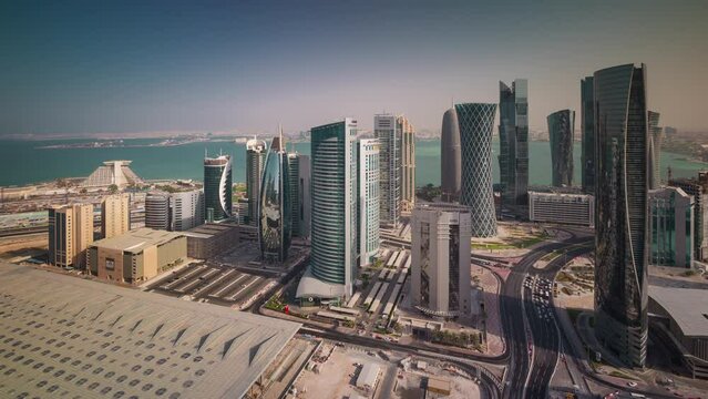 DOHA, QATAR - APRIL, 2023: Doha skyline downtown skyscrapers timelapse video from rooftop Qatar, Middle East
