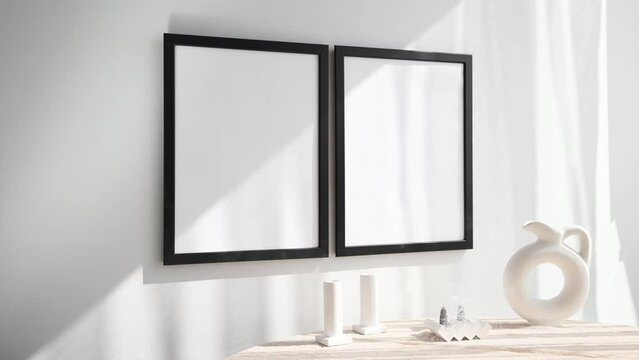 Two black 3x4 photo frames video mockup on wall with round white vase