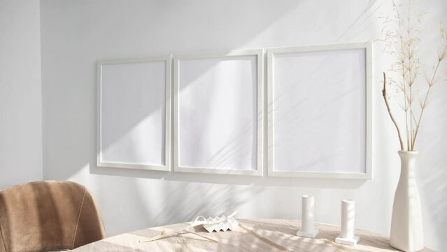 Three white 3x4 photo frames video mockup on wall 