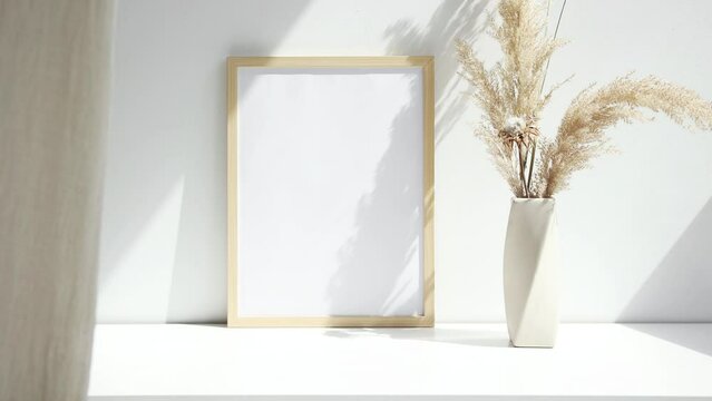 Wooden photo frame video mockup with beige vase and dry flowers