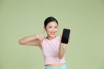 A charming beautiful attractive lady taking photo offering suggesting advising product raising her thumb up