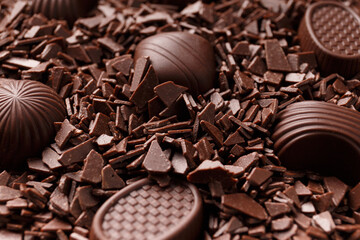 Candies in chocolate chips close-up macro photography.