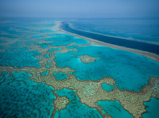 Fototapeta na wymiar Aerial view of the Great Barrier Reef, Queensland Australia on scenic flight from Airlie Beach.