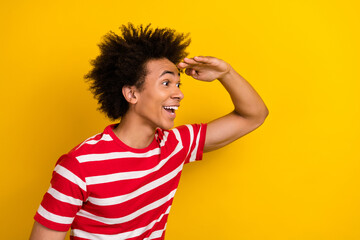 Profile portrait of impressed positive person arm touch forehead look empty space isolated on yellow color background