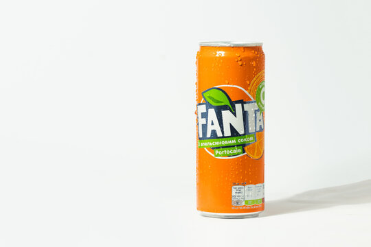 KYIV, UKRAINE - May 12: Close up shot of classic Fanta orange can on the white background. Popular product of The Coca-Cola company advertisement. Cold drink concept