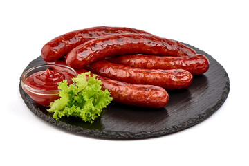 Roasted sausages, barbecued sausages, isolated on white background.